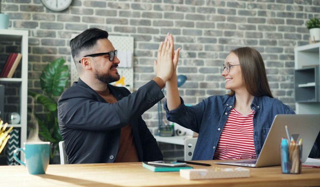 Team celebrating success – business opportunity